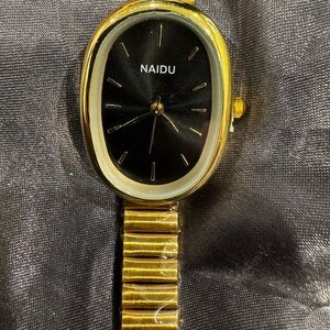 Gold and Black Wearable Watch